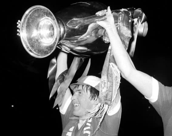 1978: Kenny Dalglish raises the European Cup at Wembley stadium. Liverpool had won it for the second successive season by beating Bruges in the final. (PA Media)