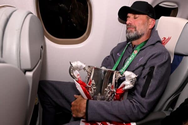 Jurgen Klopp manager of Liverpool asleep with the Carabao Cup on the flight back to Liverpool after the Carabao Cup Final between Chelsea and Liverpool at Wembley Stadium on February 25, 2024 in London, England. (Photo by Andrew Powell/Liverpool FC via Getty Images)