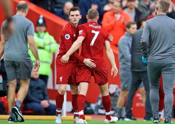 LIVERPOOL, ENGLAND - Sunday, October 7, 2018: Liverpool's James Milner (#7) is embraced by team-mate Andy Robertson (L) as he is substituted with an injury during the FA Premier League match between Liverpool FC and Manchester City FC at Anfield. (Pic by David Rawcliffe/Propaganda)