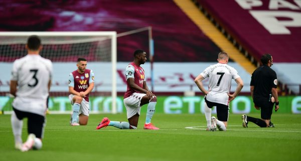 The players took a knee at the start of the game (Shaun Botterill/NMC Pool/PA)